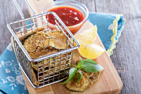 Homemade zucchini chips with breadcrumbs and parmesanの写真素材