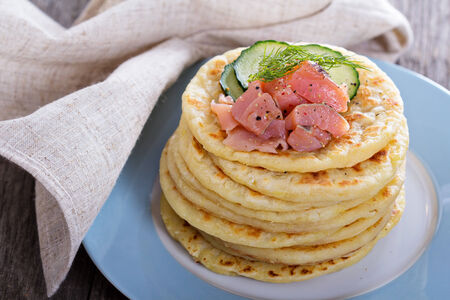 Scandinavian potato pancakes with salmonの写真素材