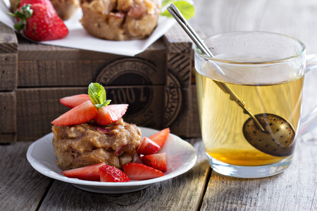 Vegan apple muffins with green teaの写真素材
