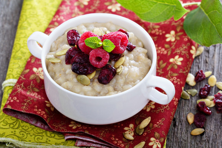 Breakfast multigrain porridge with barley, cornmeal and oatsの写真素材
