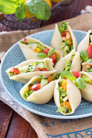 Vegetable salad served in jumbo pasta shellsの写真素材