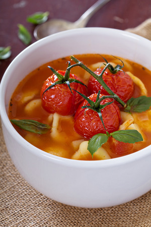Tomato soup with pastaの写真素材