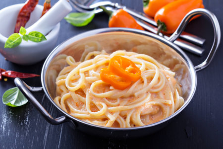 Linguine pasta with roasted red pepper sauceの写真素材