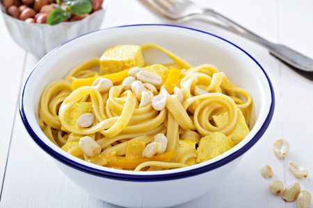 Vegan curry pasta with tofuの写真素材