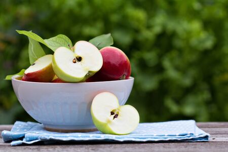 Ripe fresh apples in a bowlの写真素材