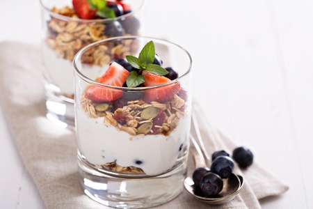 Breakfast parfait with homemade granola and yogurtの写真素材