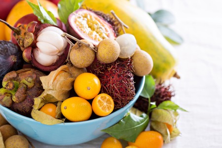 Variety of exotic fruits in a blue bowlの写真素材