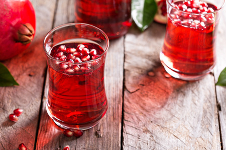 Pomegranate drink with sparkling water fall cold beverageの写真素材