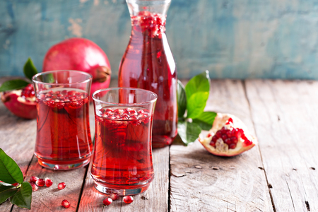 Pomegranate drink with sparkling water fall cold beverageの写真素材