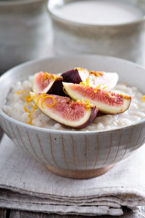 Rice pudding with vanilla, orange zest and fresh figsの写真素材