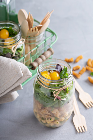 Salad in a jar with pasta and chickpeasの写真素材