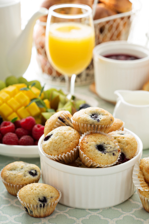 Fresh and bright continental breakfast table with fruit plateの写真素材
