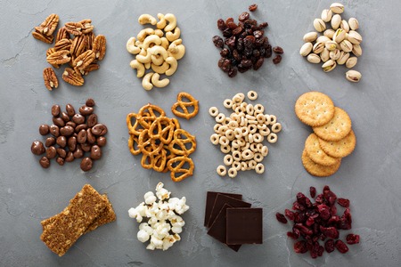 Variety of healthy snacks overhead shot laying on the table