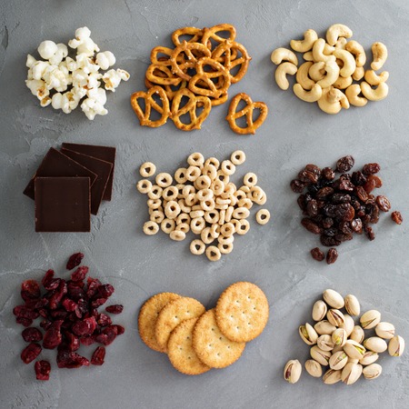 Variety of healthy snacks overhead shot laying on the tableの写真素材