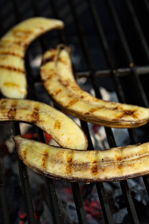 Grilled bananas for dessert being grilled on the rackの写真素材
