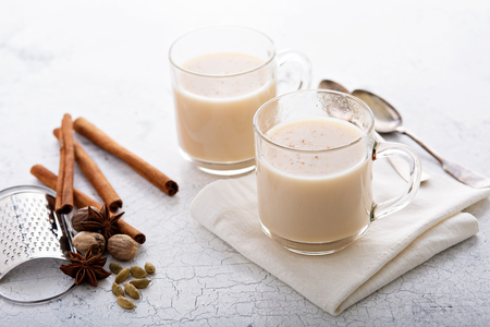 Masala tea with winter spices in two glass mugsの写真素材