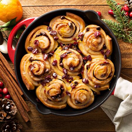 Cinnabon buns with cranberry and orange glazeの写真素材