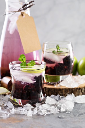Refreshing cocktail with blackberry and lavenderの写真素材