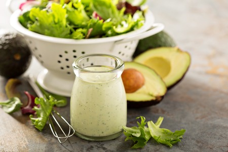 Avocado ranch dressing in small jarの写真素材