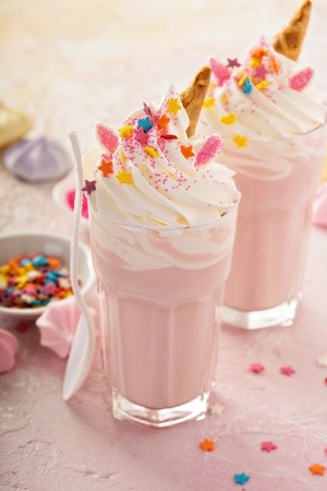 Unicorn milkshakes with sprinklesの写真素材