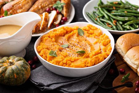 Mashed sweet potatoes on Thanksgiving tableの写真素材