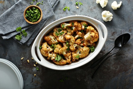 Roasted cauliflower with pine nuts and parsleyの写真素材
