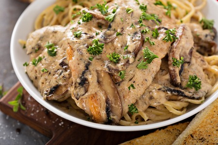 Chicken marsala with pastaの写真素材