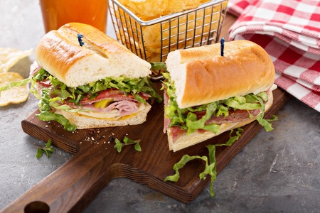 Italian sub sandwich with chipsの写真素材