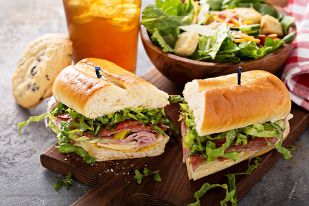 Italian sub sandwich with chipsの写真素材