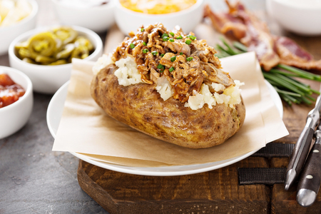 Baked potato with pulled porkの写真素材
