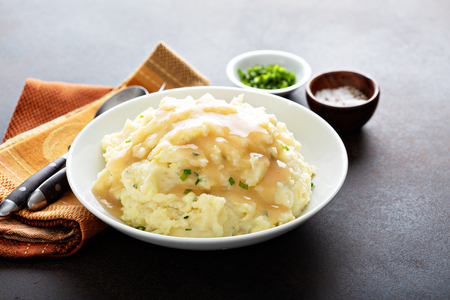 Mashed potatoes with gravy for Thanksgiving or Christmasの写真素材