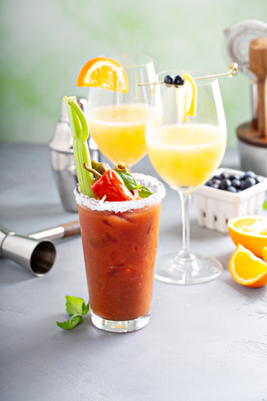 Brunch cocktails with mimosas and bloody maryの写真素材