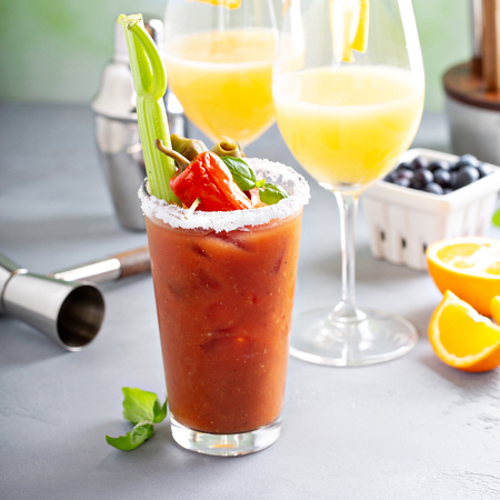 Brunch cocktails with mimosas and bloody maryの写真素材