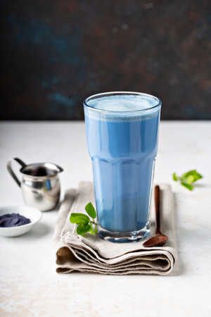 Blue matcha latte in tall glassの写真素材