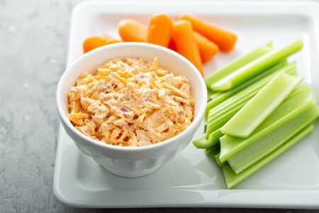 Pimento cheese with celery and carrotの写真素材