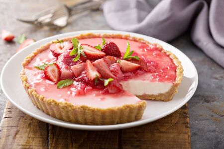 Rhubarb and strawberry cheescakeの写真素材