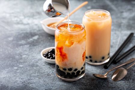 Making milk bubble tea with tapioca pearlsの写真素材