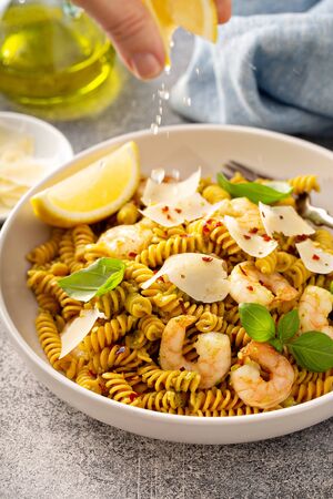 Gluten free chickpeas pasta with pesto and shrimpの写真素材