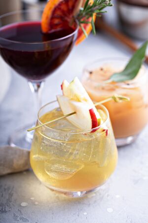 Winter and fall cocktails with apples and blood orangesの写真素材