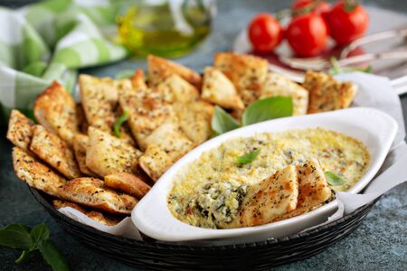 Artichoke spinach dip in a baking dishの写真素材