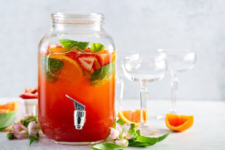 Strawberry, orange and basil sparkling punch, spring cocktailの写真素材