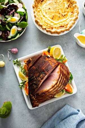 Easter ham brown sugar glazed spiral cut on the brunch table overhead