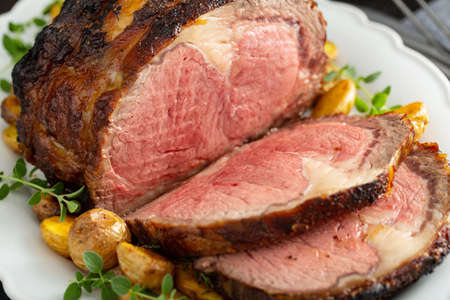 Roast beef with potatoes for a holiday dinnerの写真素材