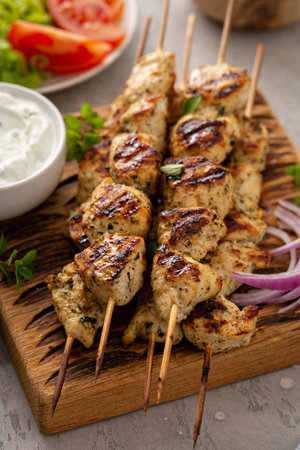 Greek chicken souvlaki with tzatzikiの写真素材