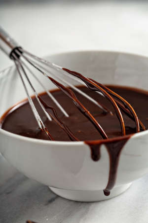 Making chocolate glaze or sauceの写真素材