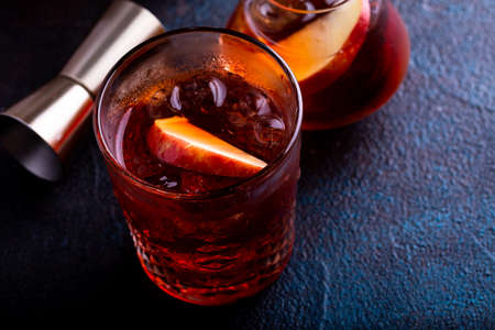 Apple old fashioned cocktail in a glassの写真素材