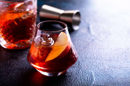 Apple old fashioned cocktail in a glassの写真素材