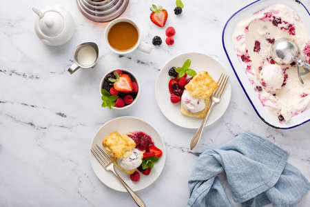 Shortcake ice cream sandwiches with fresh berriesの写真素材