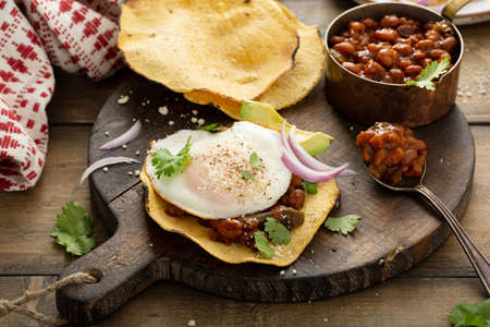 Baked beans with bacon on a toastの写真素材