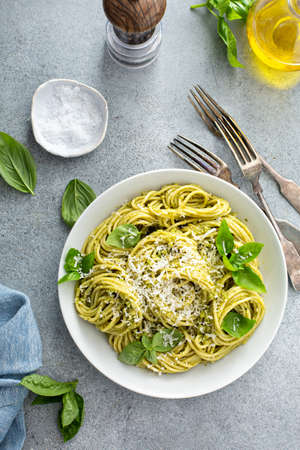 Basil pesto pasta with parmesan and olive oilの写真素材